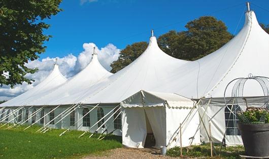 portable restrooms equipped for hygiene and comfort at an outdoor festival in Milltown